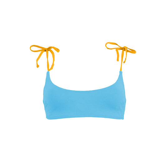 Light blue and yellow bikini top. Strappy crop top with yellow adjustable shoulder straps. Back clasp fastening. This bikini will never upset you, it will alway be one of your favorites. Top de bikini azul claro y amarillo. Crop top con tirantes amarillos ajustables. Cierre con broche en la espalda. Este bikini siempre será de tus favoritos.