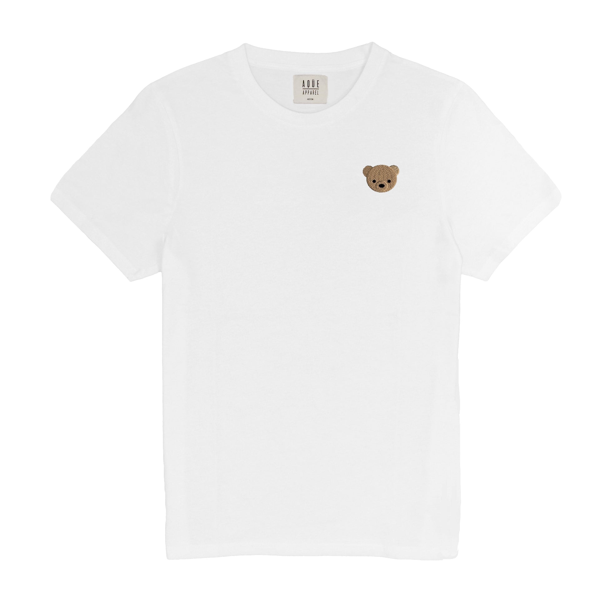 Basic cut white t-shirt with round neck and embroidered Teddy bear. 100% organic cotton. Relaxed fit. Unisex. Designed in Spain. Camiseta básica con cuello redondo. Blanca. Algodón orgánico. Corte holgado. Diseñada en España.